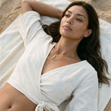 14k Crab Pendant with 2 Diamonds and 14 Tsavorites — worn on model (brunette, view 2)