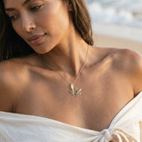 14k Crab Pendant with 2 Diamonds and 14 Tsavorites — worn on model (brunette, view 3)