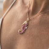 14k Single Sea Horse Pendant with Diamond and 22 Hot Pink Sapphires — worn on model (blonde, view 4)