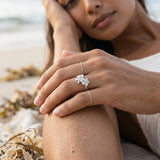 8mm 14k Plumeria Ring with 3 diamonds — worn on model (brunette, view 3)