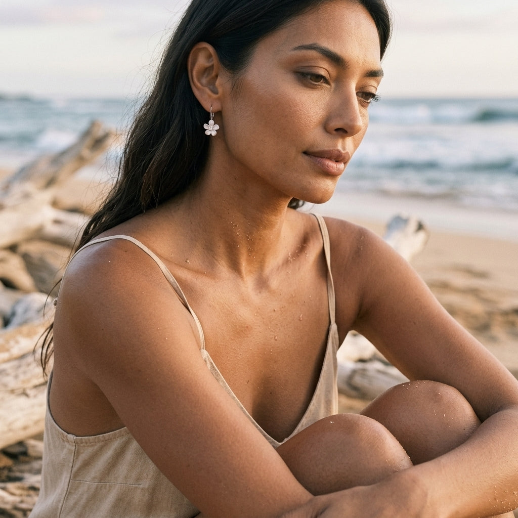 8mm 14kw Plumeria Earrings with 2 diamonds — worn on model (brunette, view 1)