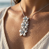 14kw Plumeria Slide Pendant with 3 blue diamonds — worn on model (brunette, view 4)
