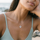14k 13mm Plumeria Slide with 0.03 carats diamond — worn on model (brunette, view 3)