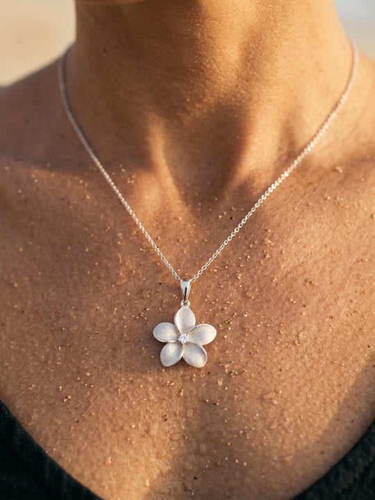 18mm 14k Plumeria Pendant with 0.05 carat diamond