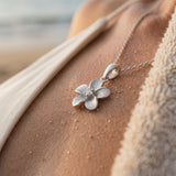 8mm 14k Plumeria Pendant with 0.02 carats diamond — worn on model (blonde, view 4)