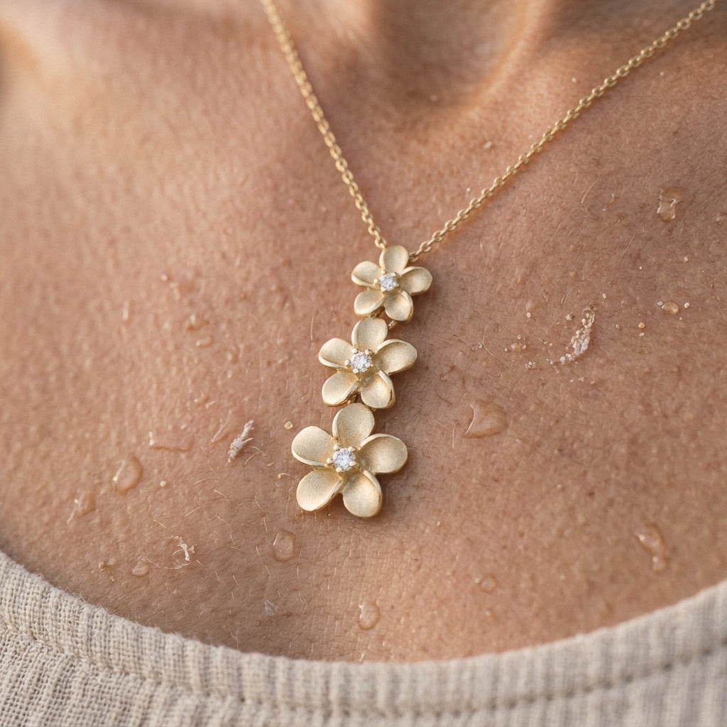 14k 6, 8 & 10mm Plumeria Lei Slide Pendant with 3 diamonds — worn on model (blonde, view 4)