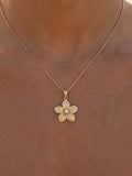 18mm 14k Plumeria Pendant with Diamond — close-up on model