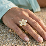 14k 18mm Plumeria Ring with diamond — worn on model (brunette, view 4)