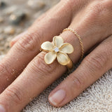 14k 15mm Plumeria Ring with Diamond — worn on model (blonde, view 4)