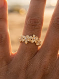 14k 8mm Plumeria Ring with 4 Diamonds — close-up on model