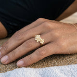 8mm 14k Plumeria Ring with 3 Diamonds — worn on model (brunette, view 4)