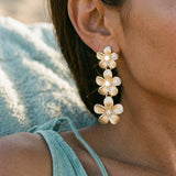 14k Plumeria Lei Earrings with 6 diamonds — worn on model (brunette, view 4)