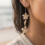 14k Plumeria Earrings with 4 diamonds — worn on model (brunette, view 4)