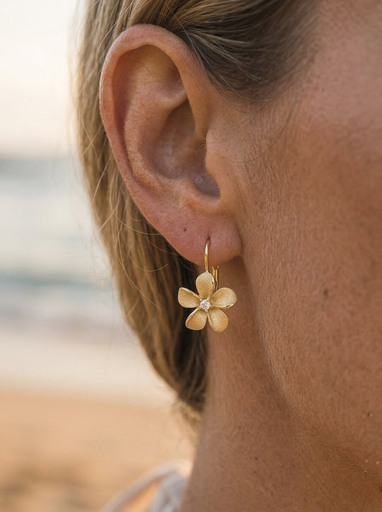 14k 11mm Plumeria Earrings Lever back with 2 diamonds