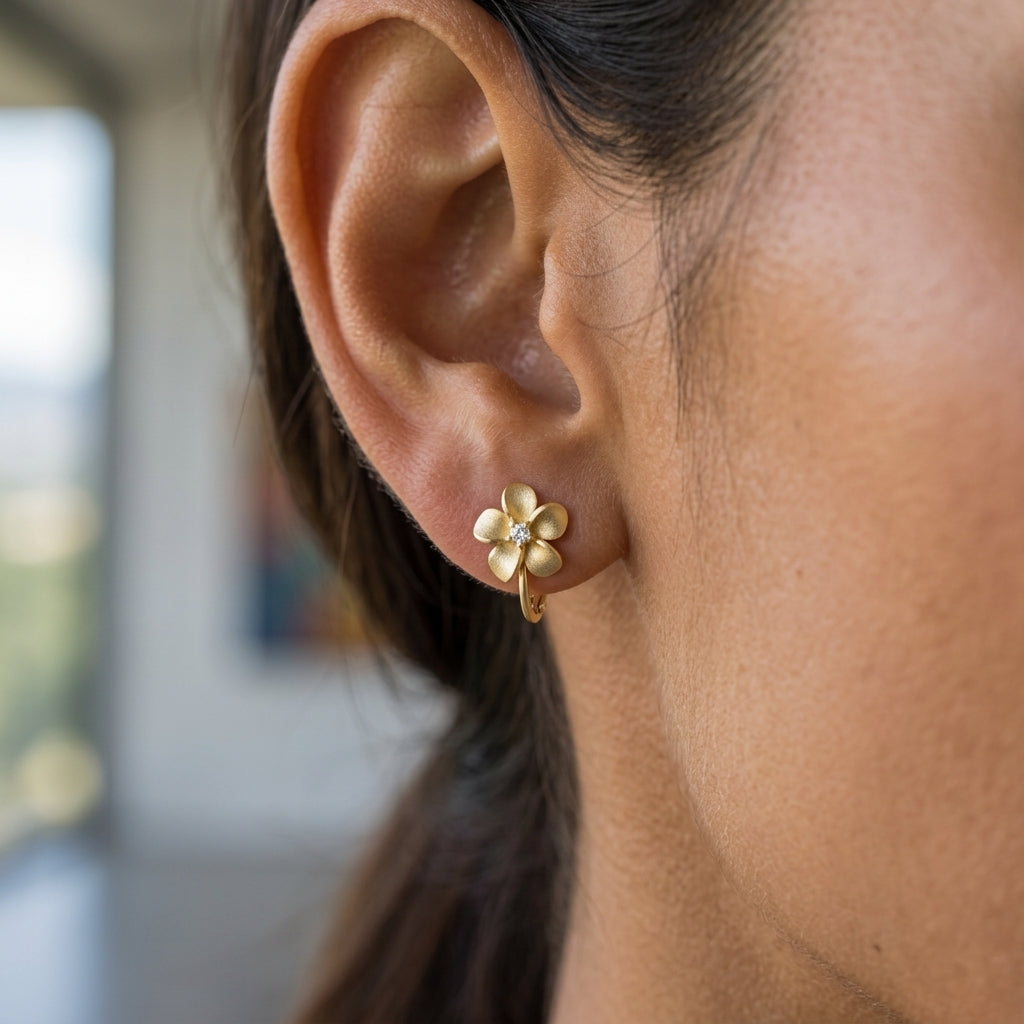 8mm 14k Plumeria Earrings with 2 diamonds — worn on model (brunette, view 2)