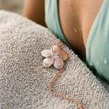 15mm 14k Plumeria Slide with diamond — worn on model (brunette, view 4)