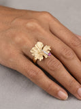 14K 20mm Hibiscus Ring with 3 Diamonds and Ruby — close-up on model