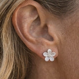 Precious Silver 13mm Plumeria Earrings with 2 White Sapphire — worn on model (blonde, view 4)
