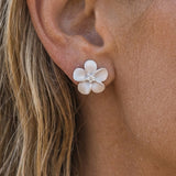 Precious Silver 11mm Plumeria Earrings with 2 White Sapphire — worn on model (blonde, view 4)