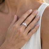 8mm Precious Silver Plumeria Ring with 3 White Sapphires — worn on model (blonde, view 3)