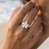 13mm Precious Silver Flower Ring with White Sapphire — worn on model (brunette, view 4)
