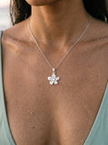 15mm Precious Silver Plumeria Slide with White Sapphire — close-up on model