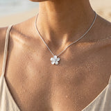 Precious Silver 13mm Plumeria Slide with White Sapphire — worn on model (brunette, view 4)