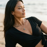 14k 2/tone Crab Pendant with 18 Blue Diamonds — worn on model (brunette, view 3)