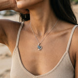 14k Crab Pendant with 18 Blue Diamonds — worn on model (brunette, view 4)
