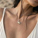 14k 2/tone Crab Pendant with 2 Diamonds and 6 Sapphires — worn on model (brunette, view 4)
