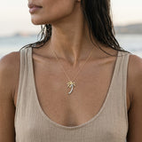 14k 2/tone 30mm Single Palm Tree Pendant with 3 Diamonds — worn on model (brunette, view 3)