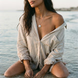 14k 21mm Sand Dollar Pendant with 12 diamonds — worn on model (brunette, view 2)