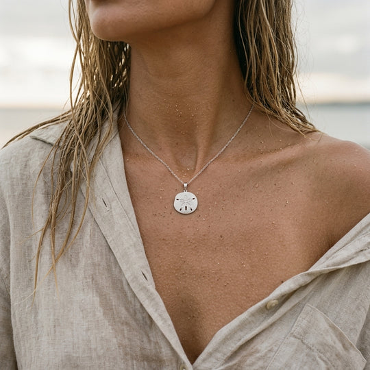 14k 21mm Sand Dollar Pendant with 12 diamonds