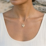 14k Mother and Baby Seal Pendant with 4 Diamonds — worn on model (brunette, view 4)