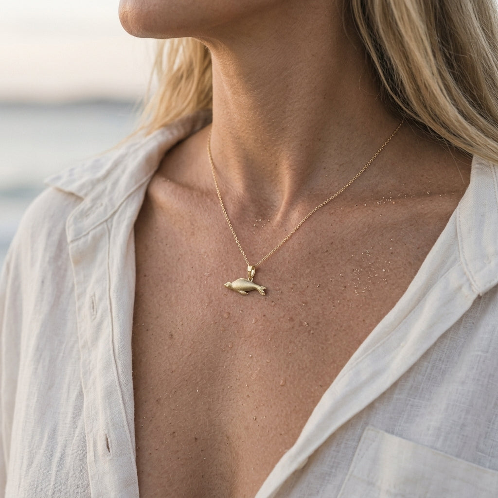 14k 20mm Seal Pendant "Searching" with 2 Diamonds — worn on model (blonde, view 3)