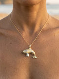 14k 40mm 2/tone (White and Yellow) Killer Whale Pendant with 2 Diamonds — close-up on model