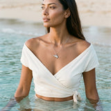 14k 2/tone Salmon Pendant with 7 Diamonds — worn on model (brunette, view 1)