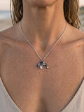 14k 20mm 2/tone (Black and White) Killing Whale Pendant with 2 Diamonds — close-up on model