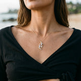 14k 2/tone Sea Horse Pendant with 5 Diamonds — worn on model (brunette, view 4)