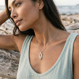 14k 2/tone Double Sea Horse Pendant with 4 Diamonds — worn on model (brunette, view 4)