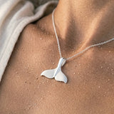 Precious Silver 26mm Whale Tail Pendant — worn on model (brunette, view 4)
