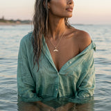 14k 20mm Whale Saw Tail Pendant — worn on model (brunette, view 2)