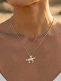 14k 2/tone 20mm Sea Turtle Pendant with 2 Diamonds — close-up on model