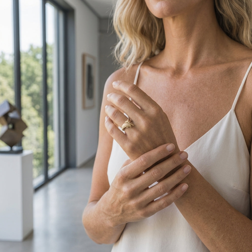 14k 20mm "Jumping Single" Dolphin Ring with 0.01 carat diamond — worn on model (blonde, view 1)