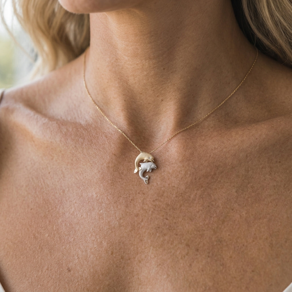 14k 2/tone 15mm "Jumping Couple" Dolphin Pendant with 2 diamonds — worn on model (blonde, view 2)