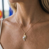 14k 2/tone 15mm "Dancing Couple" Dolphin Pendant with 2 diamonds — worn on model (blonde, view 2)