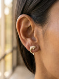 14k 15mm "Jumping Single" Stud Dolphin Earrings with 2 Diamonds — close-up on model