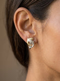 14k 2/tone 15mm "Dancing Couple" Dolphin Earrings with 4 diamonds — close-up on model