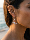 Precious Silver 22mm Crab Earrings with 4 Diamonds and 2 Tanzanite — close-up on model