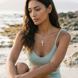 Precious Silver 20mm "Sliding Couple" Dolphin Pendant — worn on model (brunette, view 2)